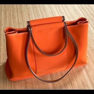 Hermès Cabag shopping bag in orange canvas and natural leather